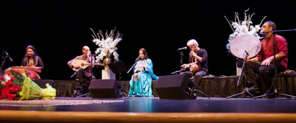 Parissa and Hamnavazan Ensemble in concert — Vancouver, June 10, 2012; santur, oud, kamancheh, and daf on stage with floral arrangements